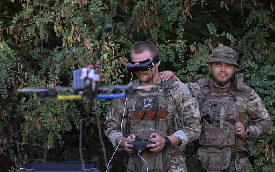 Ukrainian servicemen conduct a training flight with a first-person view drone