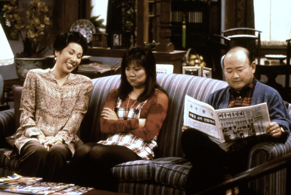 Cho (center) with her sitcom parents, Jodie Long and Clyde Kusatsu on the short-lived series, 'All-American Girl' (Photo: Touchstone Televison / Courtesy: Everett Collection)