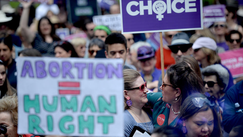 Abortion may be decriminalised in NSW if the bill passes in the lower house. A photo of an abortion rights rally.