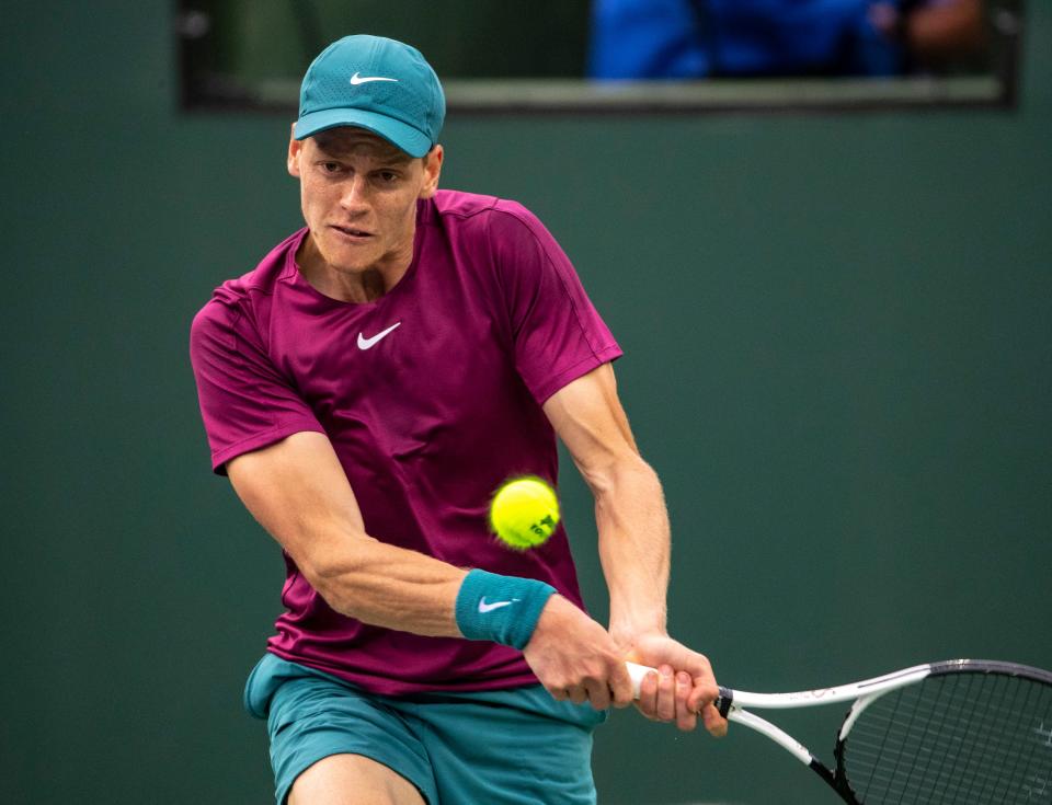 Jannik Sinner of Italy hits to Carlos Alcaraz of Spain during their semifinal match at the BNP Paribas Open at the Indian Wells Tennis Garden in Indian Wells, Calif., Saturday, March 18, 2023. 