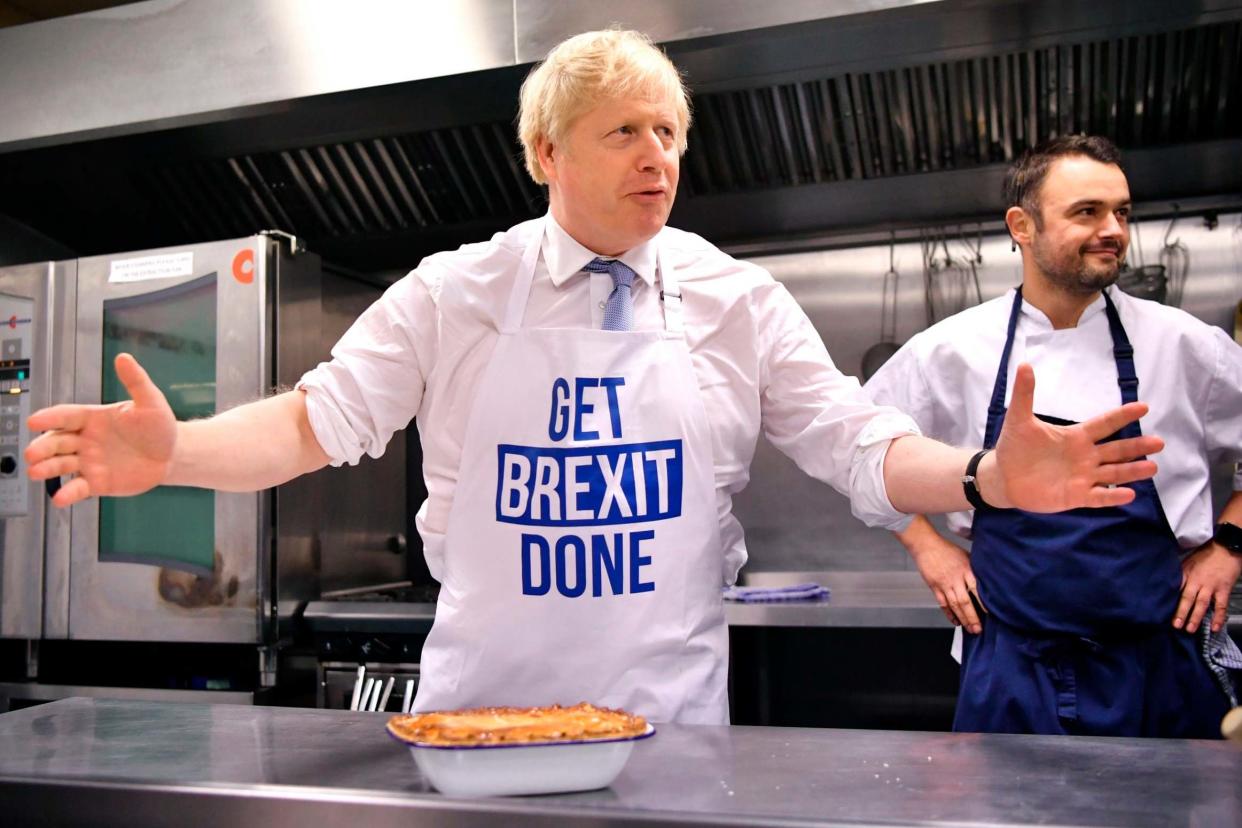 Boris Johnson says the country can enjoy Christmas dinner knowing Brexit is decided if a Tory majority is elected: AP