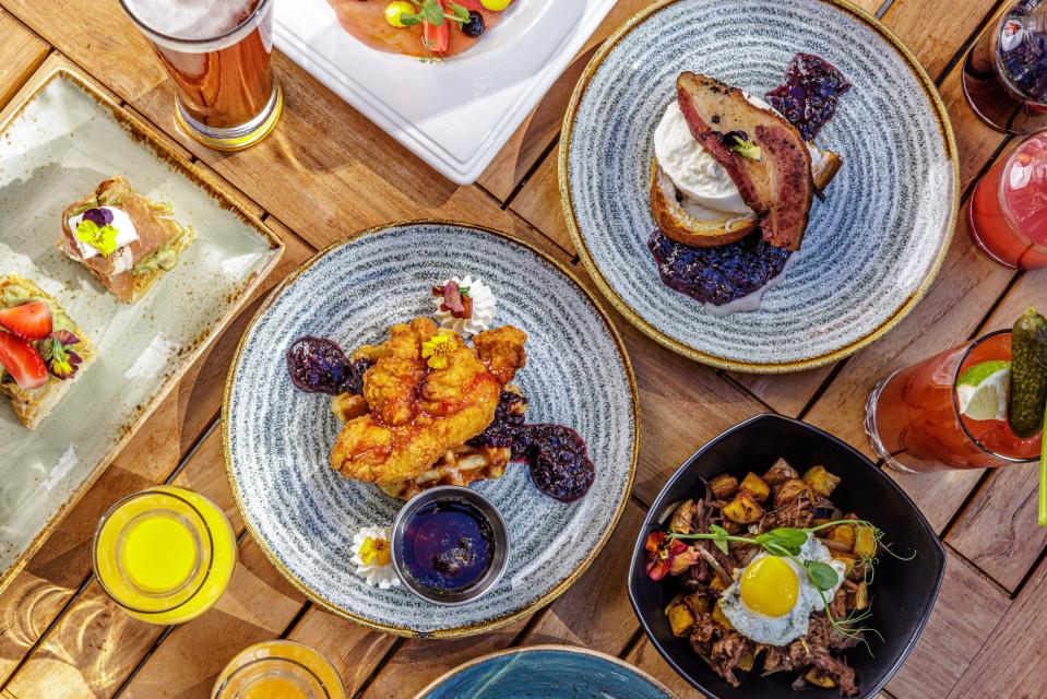 A Sunday spread of new "Bottomless Brunch" specials at Galley restaurant, located in the Hilton West Palm Beach.