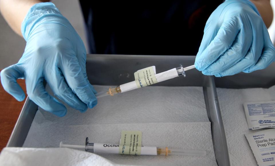 Phase 3 vaccine trial developed against COVID-19 started to be injected to volunteers in Ankara (Anadolu Agency / Anadolu Agency via Getty Images)