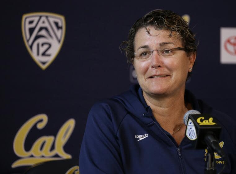 University of California at Berkeley women's swimming coach Teri McKeever answers questions during a media conference Tuesday, Feb. 17, 2015, in Berkeley, Calif. Missy Franklin is downright giddy about her two seasons swimming collegiately for California, even if it meant the delay of big-money endorsement deals that will come in a matter of months as she turns pro and gears up for the 2016 Rio de Janeiro Olympics. Franklin will soon wrap up her sophomore season in Berkeley with the Pac-12 meet and NCAAs, then quickly turn her attention toward training for this summer's world championships in Russia and another Olympics after she captured four gold medals in her Olympic debut at the 2012 London Games when just 17. (AP Photo/Ben Margot)