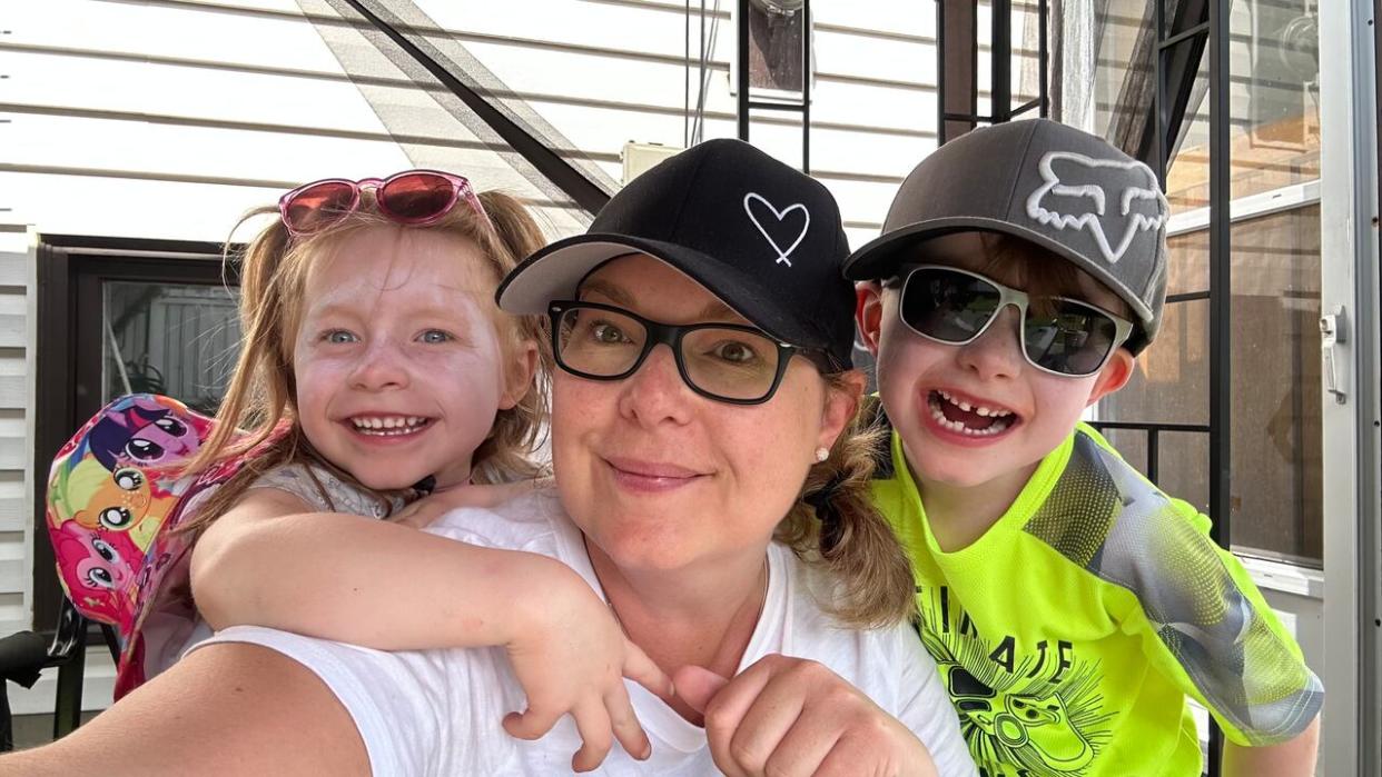 Tara Parlee is a single mom with two kids, ages five and seven. She signed them up for summer camps for the first time this year now that they've aged out of their day home. (Submitted by Tara Parlee - image credit)