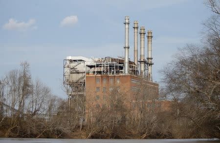 The Duke Energy coal-fired power plant is seen from the Dan River in Eden, North Carolina February 19, 2014. REUTERS/Chris Keane