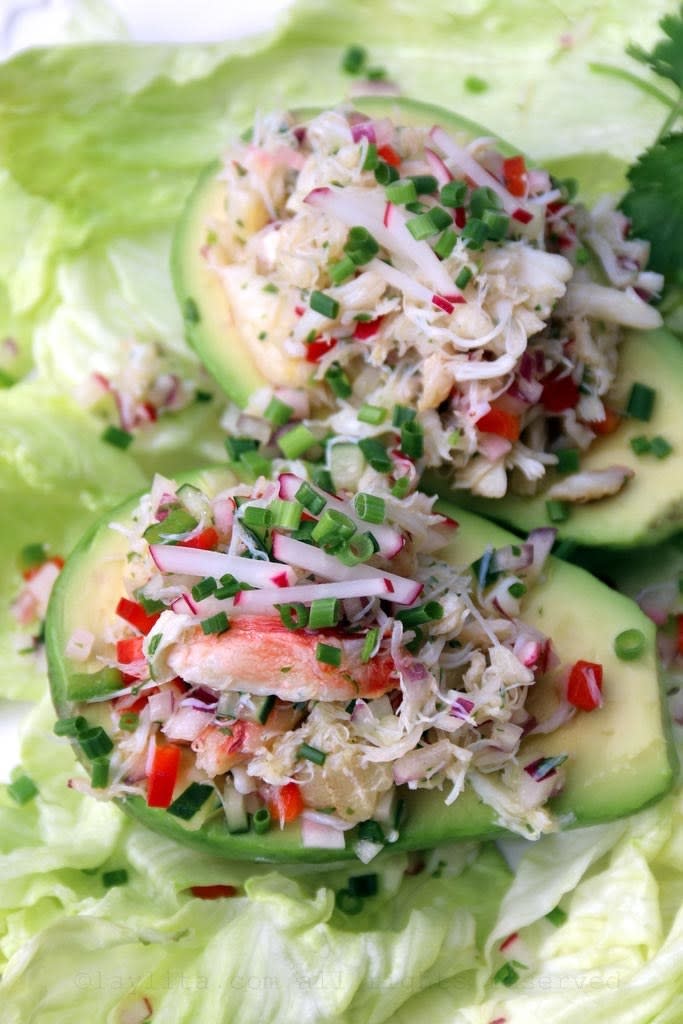 Avocado stuffed with crab salad.