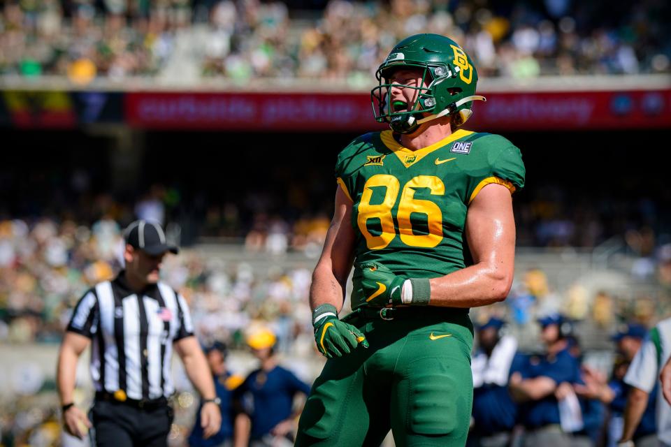 Baylor tight end Ben Sims celebrates a touchdown against West Virginia last season at McLane Stadium.