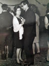 This undated photo provided by the family in April 2020 shows Enrico Giacomoni and his wife, Giulia Chiodi. The last time Roberto Giacomoni saw his 80-year-old father Enrico, he gently helped him up from bed, put his socks, shoes and jacket on, and walked him out to the paramedics who had come to take him to the hospital because he was having trouble breathing. (Courtesy of Giacomoni family via AP)