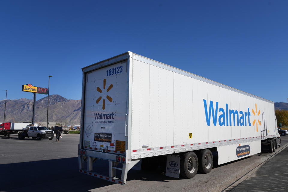 SPRINGVILLE, UT - NOVEMBER 05: A Walmart truck pulls away after fueling up along with other truckers at the Loves Truck stop on November 5, 2021 in Springville, Utah. A shortage of truck drivers has added to transportation issues contributing to global market supply chain disruptions. (Photo by George Frey/Getty Images)