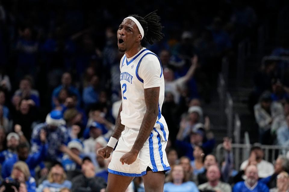 Kentucky forward Aaron Bradshaw (2) celebrates after a score during the first half of an NCAA college basketball game against North Carolina in the CBS Sports Classic, Saturday, Dec. 16, 2023, in Atlanta, Ga. (AP Photo/Brynn Anderson)