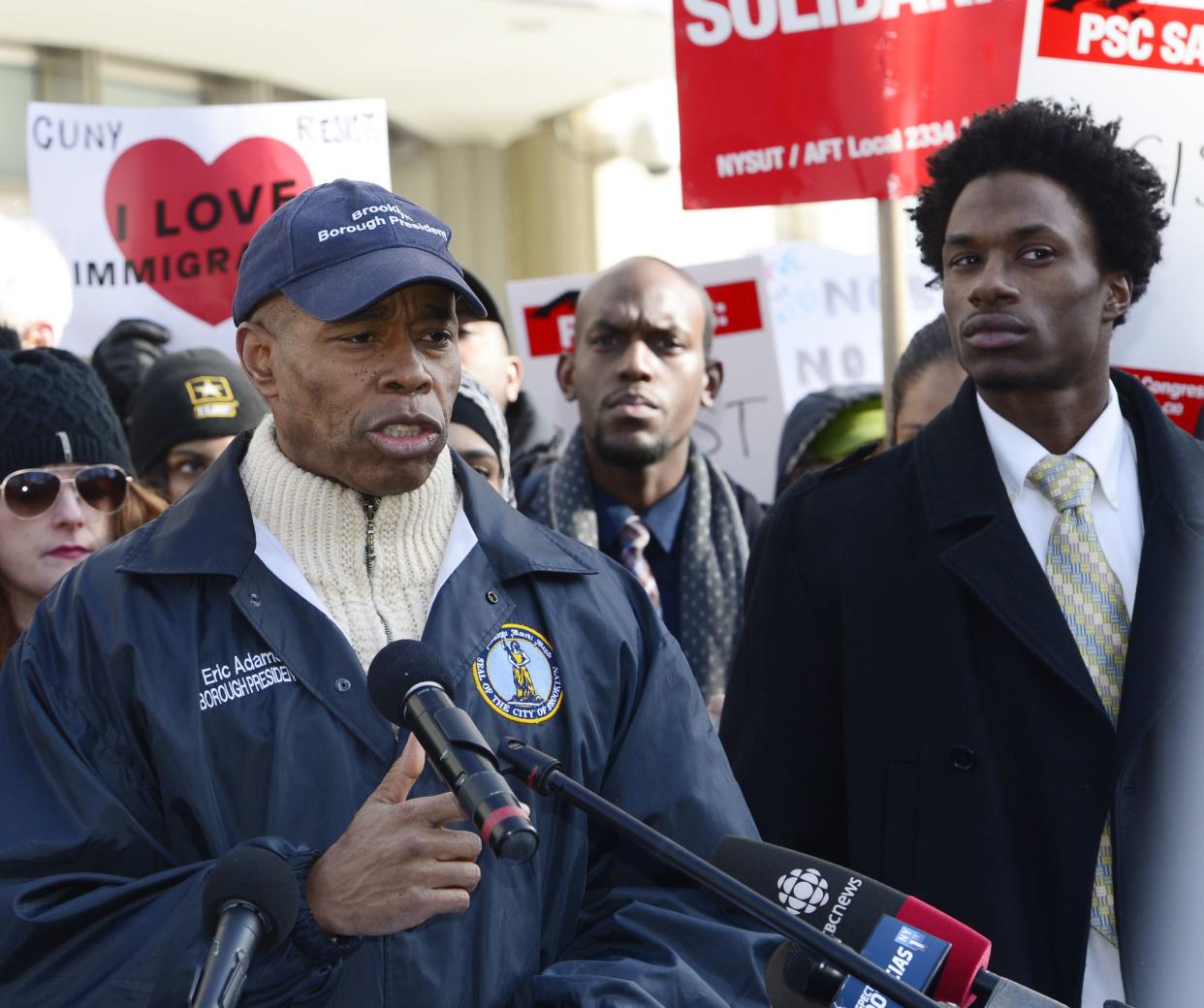 Then-Brooklyn borough president Eric Adams (left) and Hercules Reid (right) outside Federal Court in Brooklyn, New York on Jan. 30, 2017. 