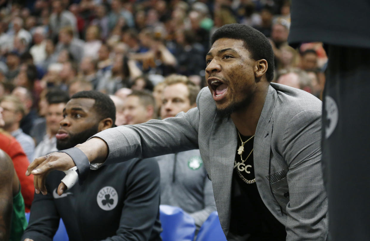 Marcus Smart even controls the Celtics defense from the bench. (AP)