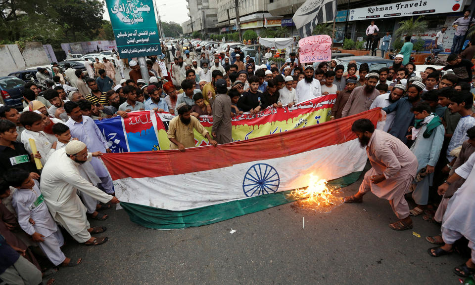 Supporters of Islamic charity organization Jamaat-ud-Dawa chant anti-India slogans in Karachi