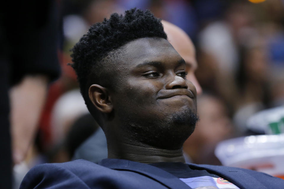 MIAMI, FLORIDA - NOVEMBER 16: Zion Williamson #1 of the New Orleans Pelicans looks on from the bench against the Miami Heat during the first half at American Airlines Arena on November 16, 2019 in Miami, Florida. NOTE TO USER: User expressly acknowledges and agrees that, by downloading and/or using this photograph, user is consenting to the terms and conditions of the Getty Images License Agreement. (Photo by Michael Reaves/Getty Images)