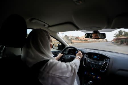 Dr Samira al-Ghamdi, 47, a practicing psychologist, drives around the side roads of a neighborhood as she prepares to hit the road on Sunday as a licensed driver, in Jeddah, Saudi Arabia June 21, 2018. Picture taken June 21, 2018. REUTERS/Zohra Bensemra