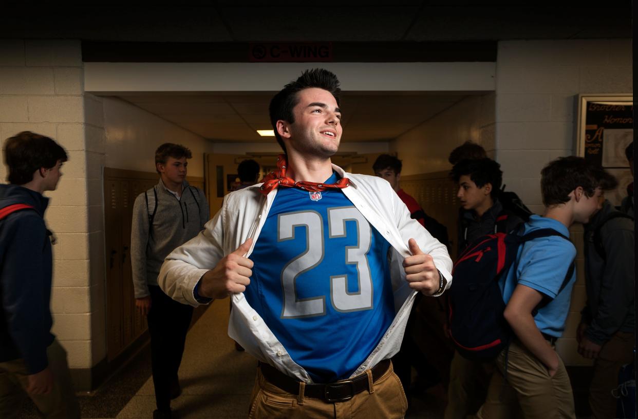 Detroit Lions Superfan Danny Ervin, then 17 of Bloomfield Hills, wore a Lions jersey to class at Brother Rice High School in 2019.