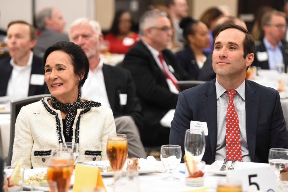 Mar 22, 2024; Tuscaloosa, Alabama, USA; The Black Warrior Council of the Boy Scouts of America honored Pettus and Cathy Randall with the Circle of Honor distinction Friday. Cathy Randall and her son Pettus Randall Jr. watch a video of people speaking about the Randall family’s contributions to Tuscaloosa.