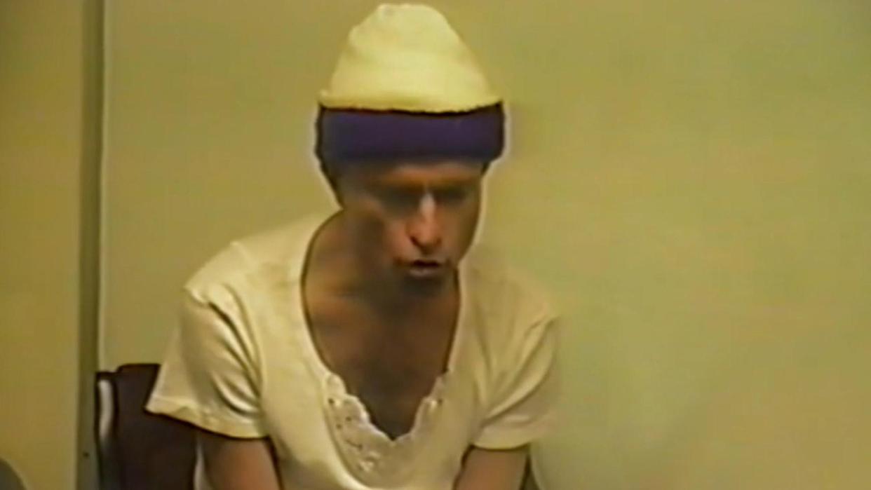 Hadden Clark wearing a white beanie and a white shirt