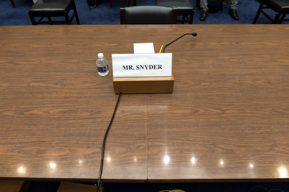 FILE - A placard for Washington Commanders' Dan Snyder is seen during a Hous​e Oversight Committee hearing on the Commanders' workplace conduct, on Capitol Hill in Washington, Wednesday, June 22, 2022. Snyder is set to testify later Thursday morning, July 28, before a congressional committee that is investigating the NFL team’s history of workplace misconduct.(AP Photo/Jacquelyn Martin, File)