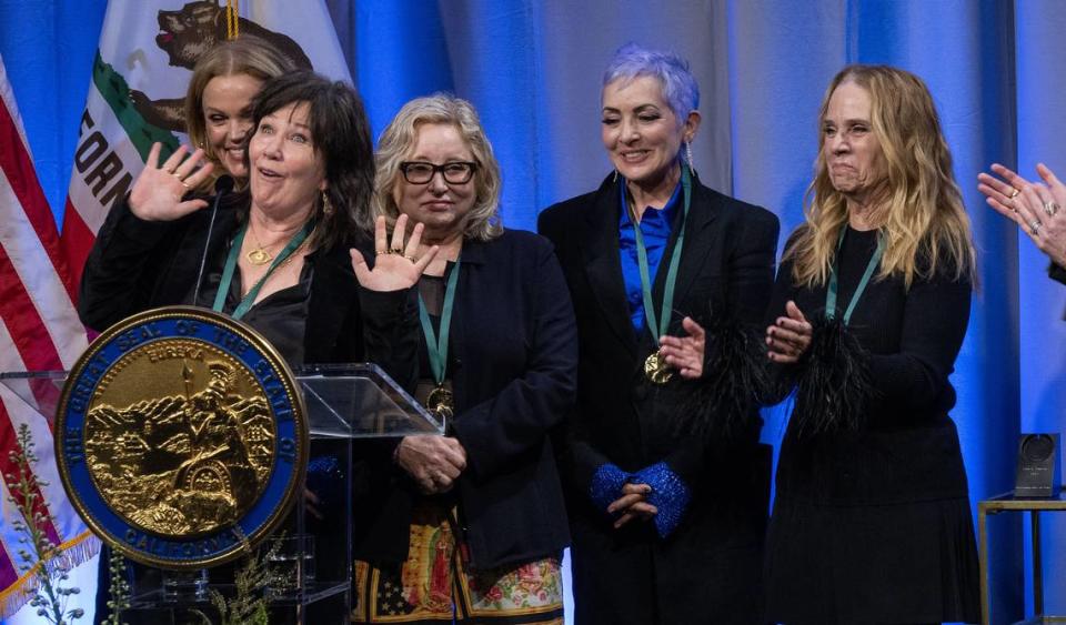 Kathy Valentine of the Go-Go’s is overjoyed as she speaks after being inducted into the California Hall of Fame on Tuesday, Feb. 6, 2024, at the California Museum in Sacramento. Hector Amezcua/hamezcua@sacbee.com