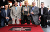 <p>Actor Adam West (C) poses with actor and producer Seth MacFarlane (L), Hollywood Chamber of Commerce President and CEO Leron Gubler, City Councilmember Tom LaBonge, and radio personality Ralph Garman, after receiving a star on the Hollywood Walk of Fame in Los Angeles, Calif., April 5, 2012. (Photo: Phil McCarten/Reuters) </p>