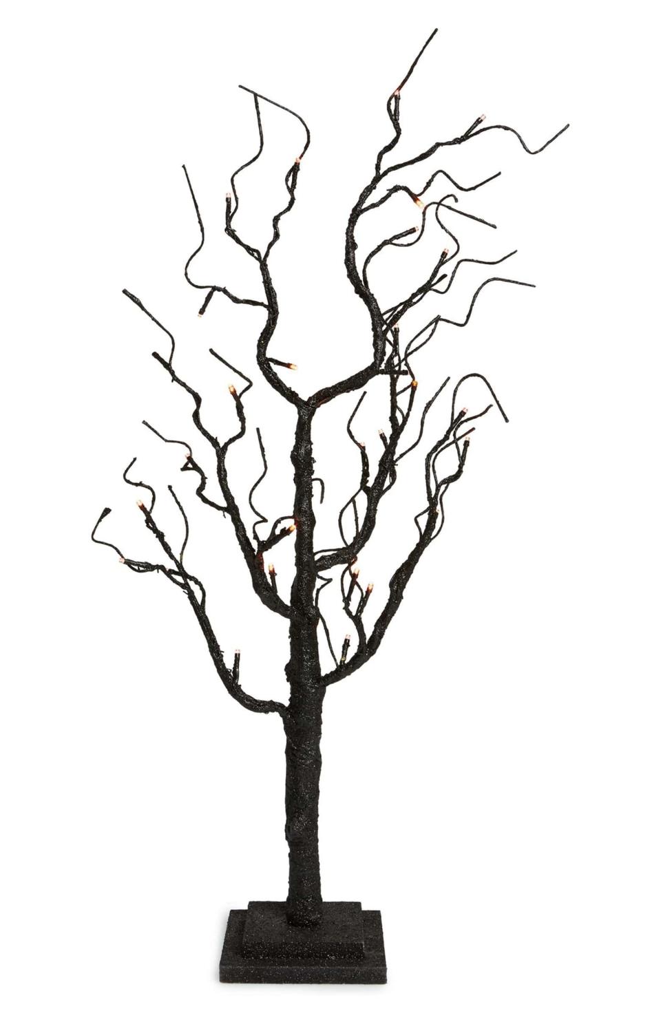 <p>Turn your table top into a Halloween forest with one (or more) of these eery trees.</p> <p><strong>Shop now:</strong> Fantastic Craft LED Orange Light Twig Tree, $59. <a rel="nofollow noopener" href="https://shop.nordstrom.com/s/fantastic-craft-led-orange-light-twig-tree/3754209?origin=keywordsearch-personalizedsort&breadcrumb=Home%2FAll%20Results%2FHome&color=none" target="_blank" data-ylk="slk:shop.nordstrom.com;elm:context_link;itc:0;sec:content-canvas" class="link ">shop.nordstrom.com</a></p>