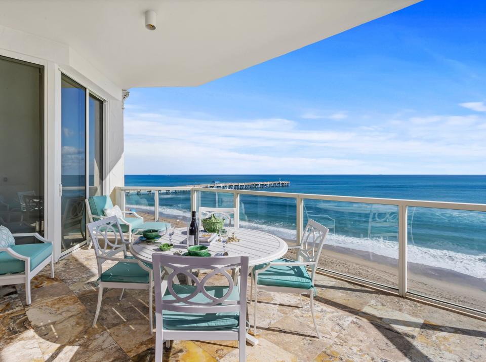 The oceanside balcony of Unit 507 offers wide views of the Atlantic and the Lake Worth Beach pier.