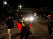 Demonstrators take part in a protest at the National University as a national strike continues in Bogota