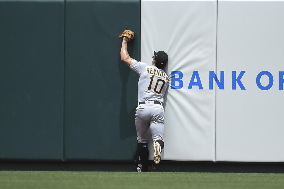 Pittsburgh Pirates center fielder Bryan Reynolds catches a fly ball hit by St. Louis Cardinals' Paul Goldschmidt during the third inning of a baseball game Saturday, June 26, 2021, in St. Louis. (AP Photo/Joe Puetz)