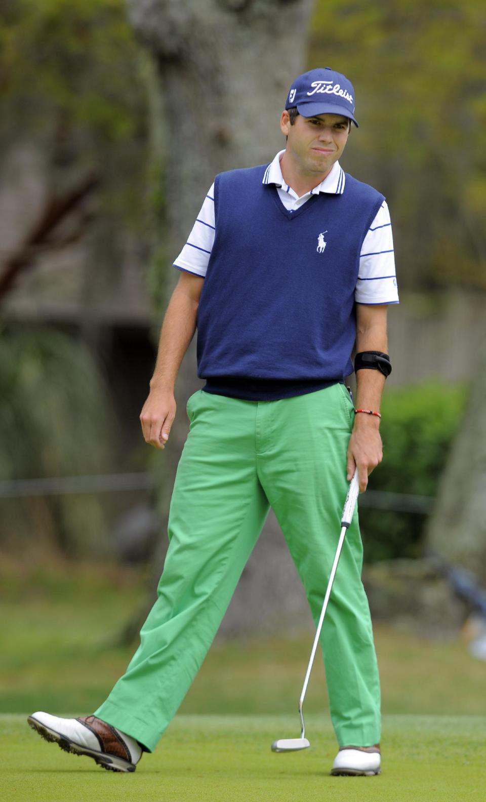 Ben Martin watches his birdie putt go in on the second hole during the final round of the RBC Heritage golf tournament in Hilton Head Island, S.C., Sunday, April 20, 2014. (AP Photo/Stephen B. Morton)