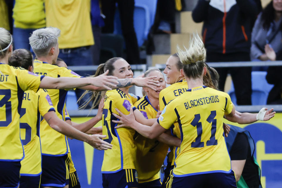 Sweden's Magdalena Eriksson, second from right, ceelbrates scoring with team mates during the UEFA Women's Nations League soccer match between Sweden and Spain at Gamla Ullevi stadium in Gothenburg, Sweden, Friday, Sept. 22, 2023. (Björn Larsson Rosvall/TT News Agency via AP)