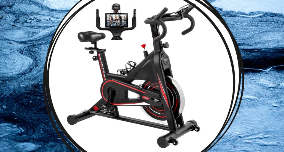 amazon black and red stationary bike with tablet screen