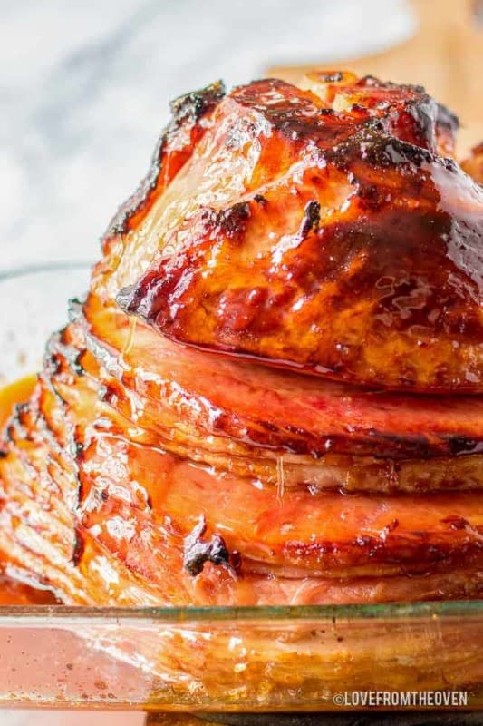 <p>Love from the Oven</p><p>Skip the long lines at the honey-baked ham store and make a delicious brown sugar glaze spiral ham at home in your own oven.</p><p><strong>Get the recipe: <a href="https://www.lovefromtheoven.com/brown-sugar-glaze-spiral-ham-recipe/" rel="nofollow noopener" target="_blank" data-ylk="slk:Brown Sugar Spiral Ham Glaze;elm:context_link;itc:0;sec:content-canvas" class="link rapid-noclick-resp">Brown Sugar Spiral Ham Glaze</a></strong></p>