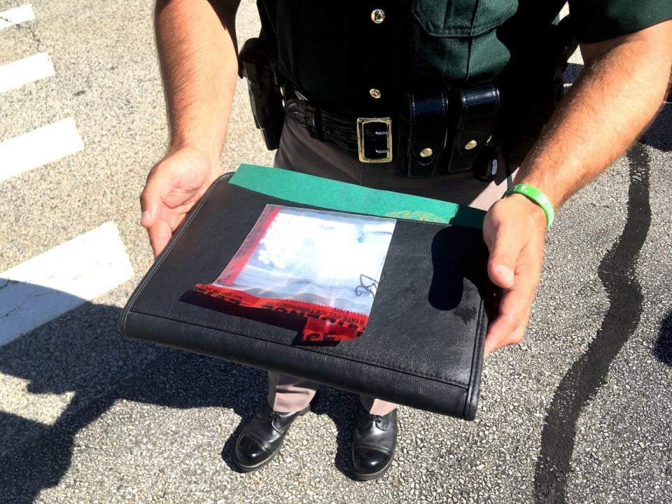 New Hampshire State Police Col. Nathan Noyes shows a series of pills Thursday, June 30, 2022, that the state says were laced with fentanyl, as officials warn of the rise of fentanyl hidden in black market drugs.