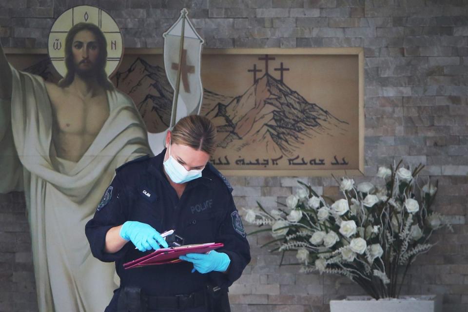 A member of NSW Forensic police is seen at Christ The Good Shepherd Church (Getty Images)