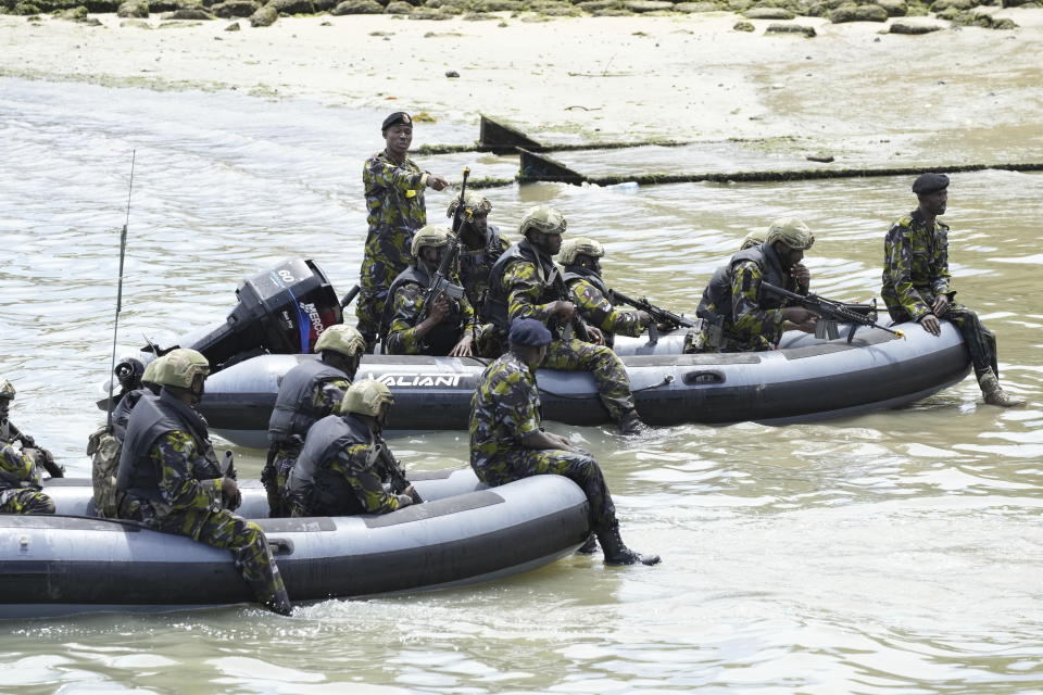 FILE - Kenya's military personnel practice maneuvers as part of Britain's King Charles III's visit to the Mtongwe Naval Base in Mombasa, Kenya, Nov. 2, 2023. Ogolla died in a helicopter crash west of the country, President William Ruto announced Thursday, April 18, 2024, evening and declared three days of national mourning. (AP Photo/Brian Inganga, File)