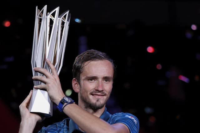 Daniil Medvedev holds aloft his trophy from the Shanghai Masters 