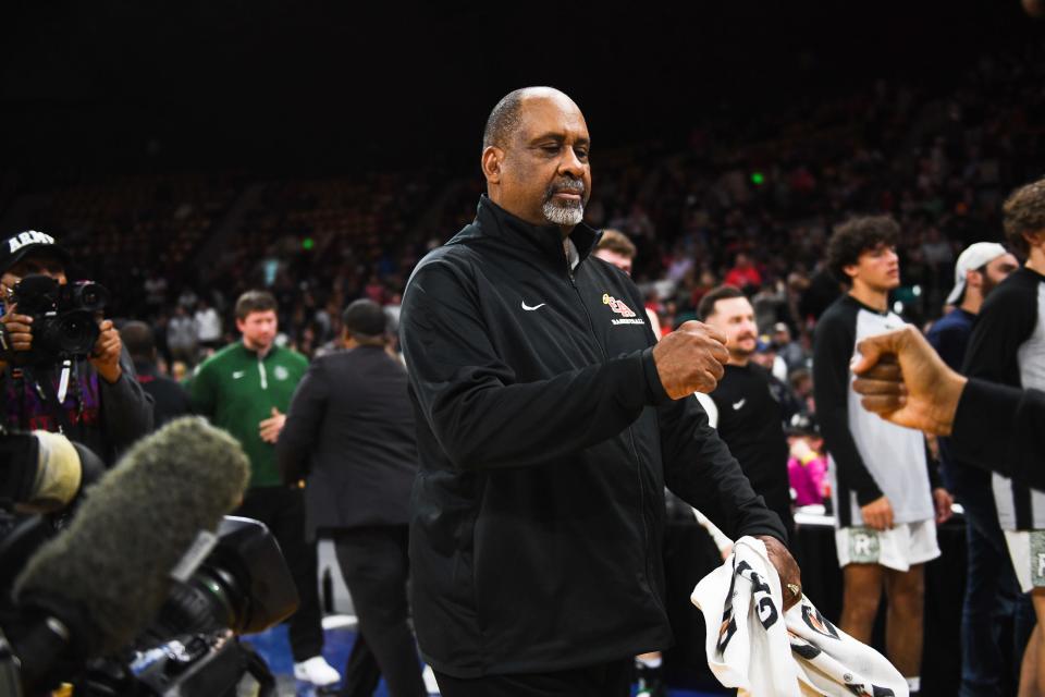 Denver East boys basketball head coach Rudy Carey reacts after winning the 6A state championship against Fossil Ridge at the Denver Coliseum on Saturday, March 11, 2023, in Denver, Colo. The SaberCats lost 82-61.