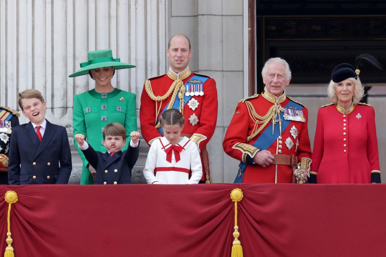 Prince George of Wales, Prince Louis of Wales, Catherine, Princess of Wales, Princess Charlotte of Wales, Prince William, Prince of Wales, King Charles III and Queen Camilla stand on the balcony of Buckingham Palace (Getty Images)