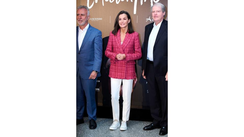 Queen Letizia rocking a pink tweed blazer and white trousers