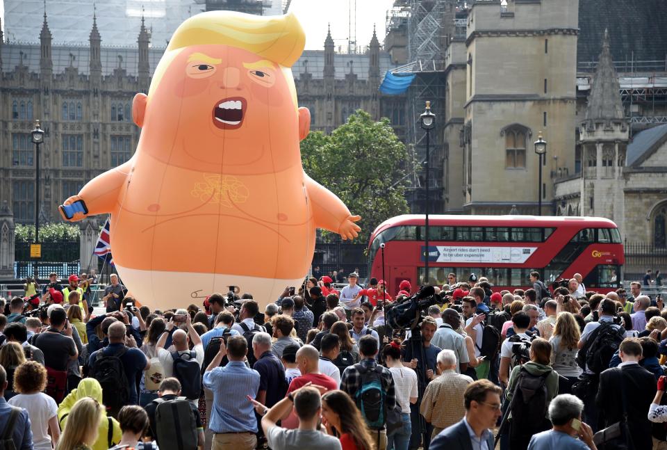 Protesters gather in London for the anti-Trump march (Rex)