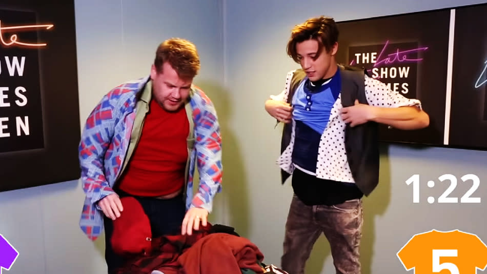 Watch James Corden and Cameron Dallas perform a funny and impressive two-minute clothing challenge