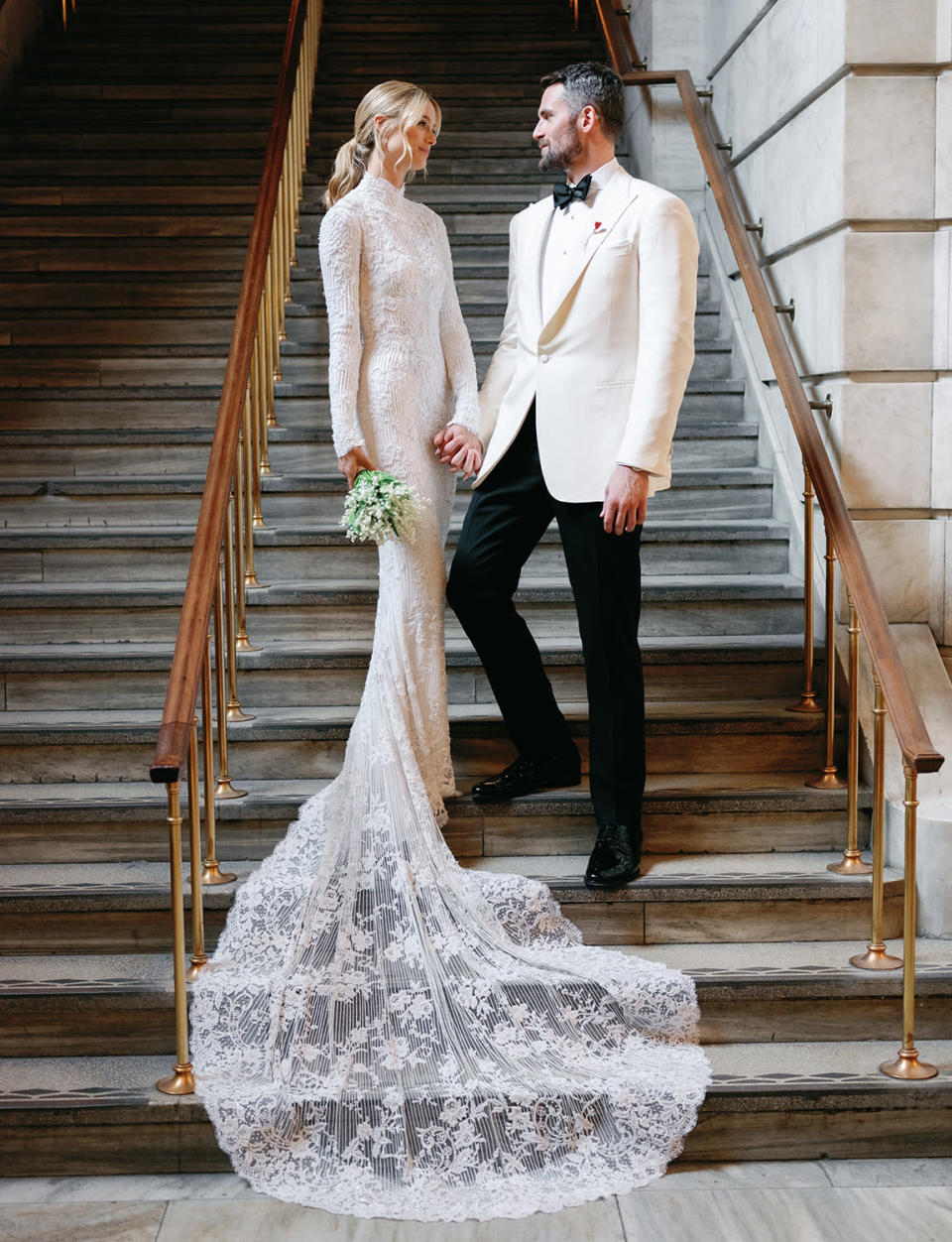 <p>The couple looking chic, elegant and timeless in their custom Ralph Lauren ceremony ensembles. </p>