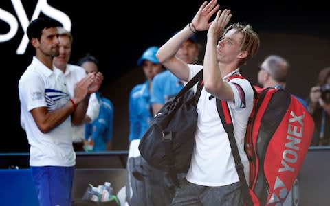 Denis Shapovalov applauds the crowd on Rod Laver after his loss to Novak Djokovic - Credit: Reuters