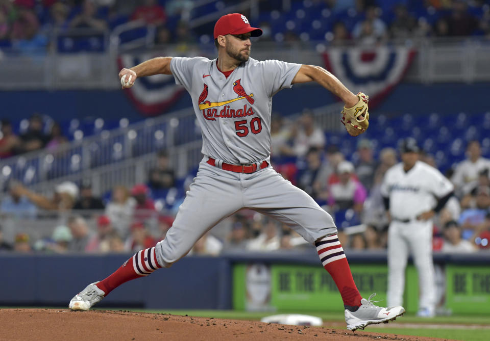 St. Louis Cardinals' starting pitcher Adam Wainwright delivers against the Miami Marlins during the first inning of a baseball game Tuesday, April 19, 2022, in Miami. (AP Photo/Jim Rassol)