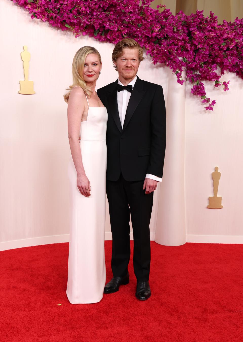 Image may contain: Jesse Plemons, Kirsten Dunst, Fashion, Clothing, Formal Wear, Suit, Accessories, Tie, Adult, and Person