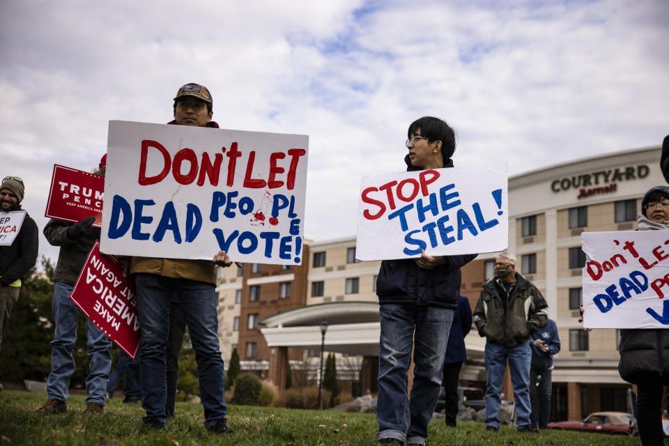 Former President Donald Trump lost the 2020 election, but the conspiracy theories he stoked &mdash; including about dead people casting ballots &mdash; and the extremism he inspired has generated a wave of anti-democratic legislation in state legislatures nationwide. (Photo: (Photo by Samuel Corum/Getty Images))