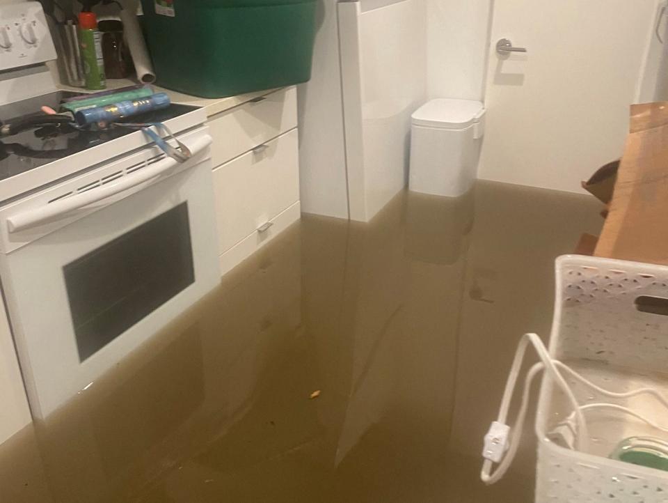 A view shows flood water in the kitchen of an apartment, in Dallas, Texas, U.S. August 22, 2022.