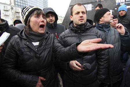 Pro-Russian supporters take part in a rally outside the regional administration in Donetsk March 17, 2014. REUTERS/Stringer